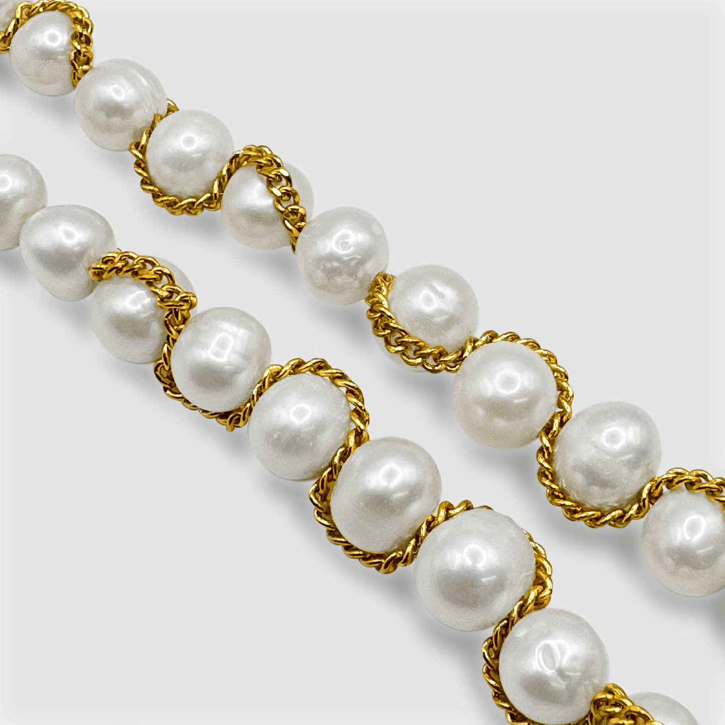 Collana con Perle Vere avvolta in Catena (Oro)